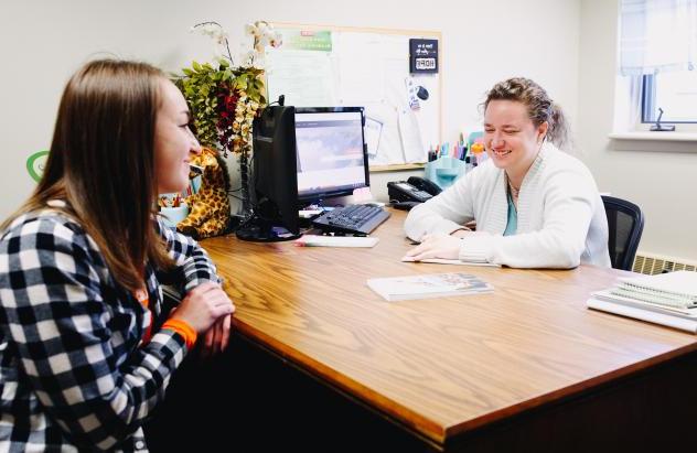 student with counselor